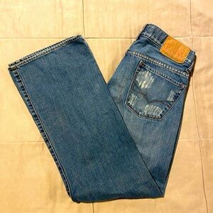GUESS men’s distressed jeans